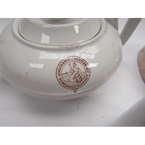 4071 - Four pieces of pre-nationalisation company crockery to include LNWR teapot, LNER tea cup, GNR cream ... 