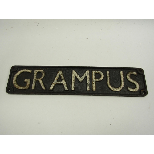 4090 - A cast iron wagon plate - Grampus, 49cm long