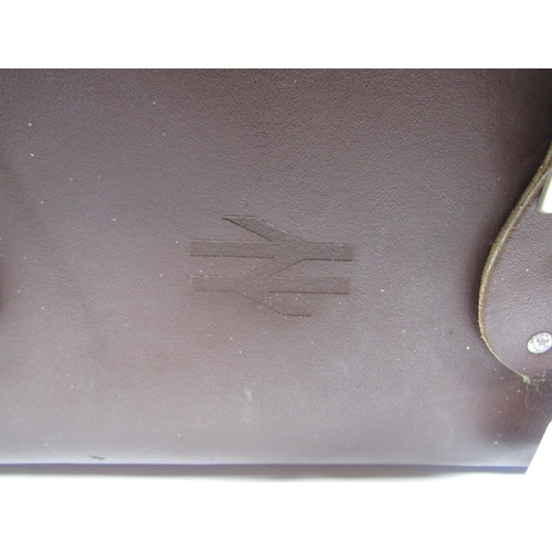 4098 - A brown leather guards stachel with British Rail double arrow logo and lamp fixing to side