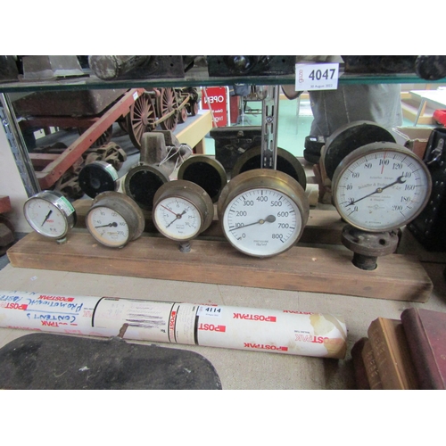 4113 - Five pressure gauges mounted on wooden block, one marked Schaffer & Budenburg Ltd