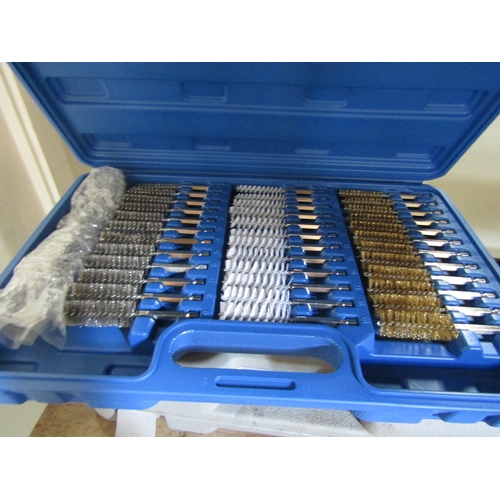 4132 - Three cased drill bit sets and a case of brushes