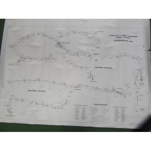 4180 - A rolled black and while map showing the M&GN Rail network