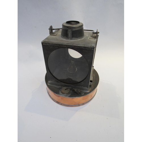 4184 - A GWR signal lamp exterior with matching interior on wooden block