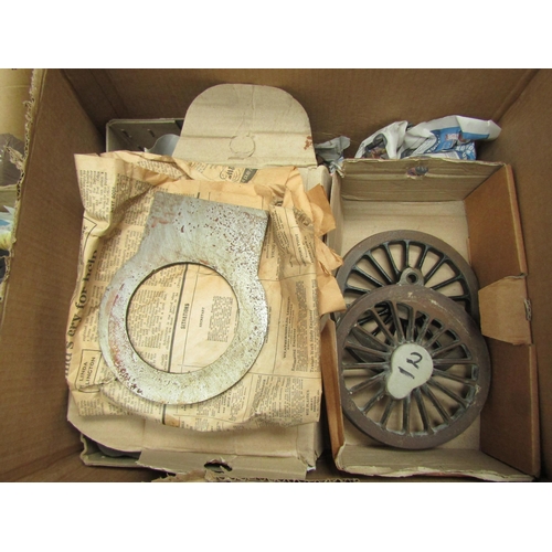 4197 - Two boxes containing various castings for model steam locomotives including wheels, axle boxes, etc