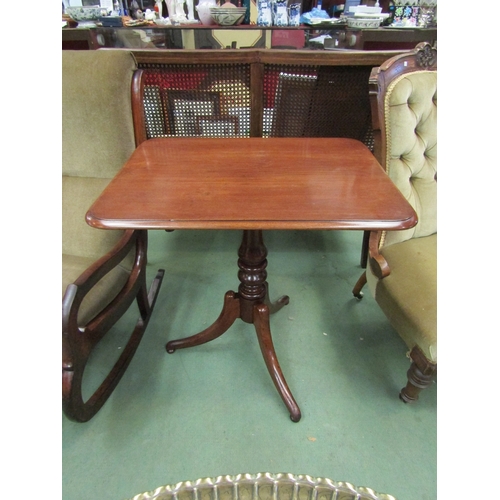 107 - Circa 1830 a mahogany tilt top wine table over a turned baluster column and outswept tripod base on ... 