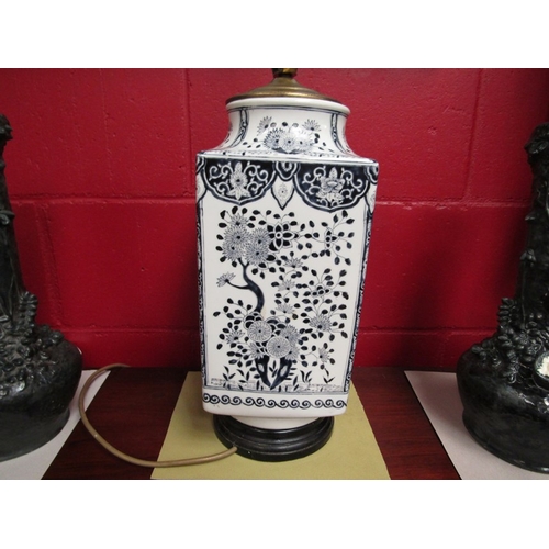 147 - A Chinese blue and white hand-painted vase converted into a table lamp, 42cm tall