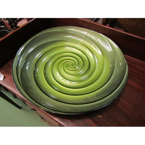 177 - A large glass dish with swirl design, 43.5cm diameter