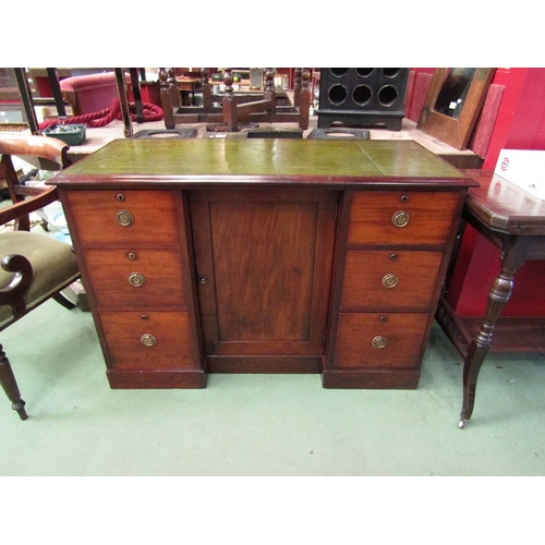 180 - Circa 1860 a mahogany breakfront desk, the gilt tooled leather insert writing surface over six drawe... 