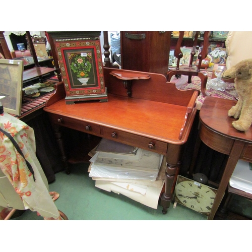 195 - Circa 1860 a mahogany washstand the three quarter raised gallery with central candle shelf and scrol... 