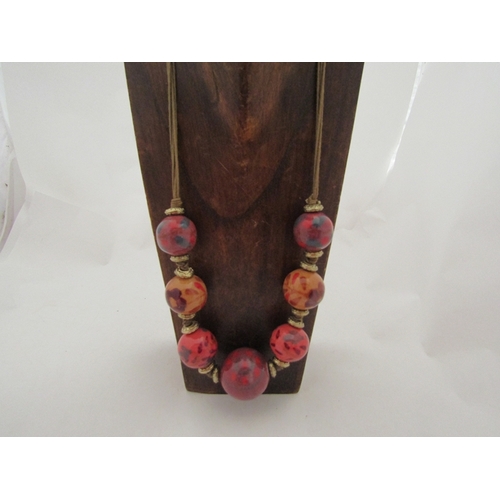 319 - A ceramic bead necklace