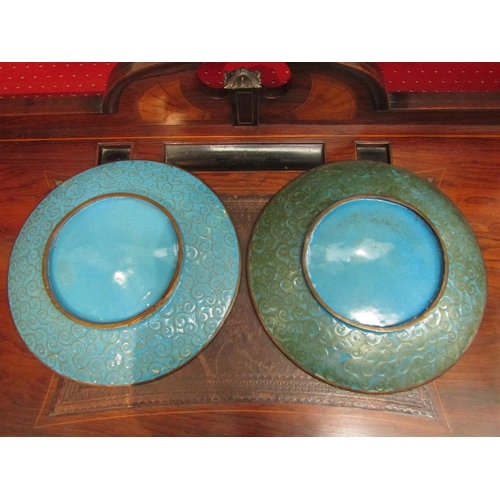 100 - A pair of cloisonne decorative plates depicting cranes 30cm in diameter