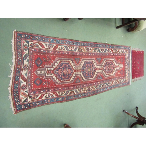 108 - Two wool rugs, red ground, geometric design, multiple borders    (E) £30-40