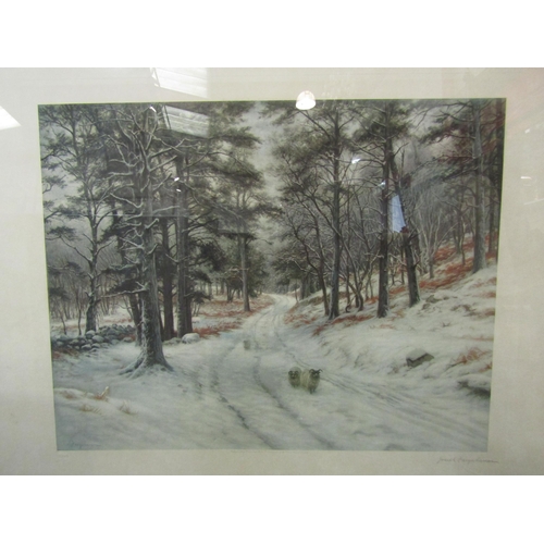 168 - A Farquharson Fine Art print depicting snowy lane with sheep, pencil signed, copyright 1920, framed ... 