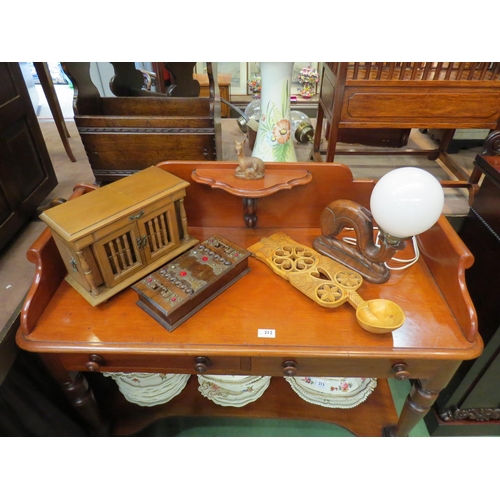 194 - Five wooden mid-20th Century items including a carved table lamp of whale form with glass ball shade... 