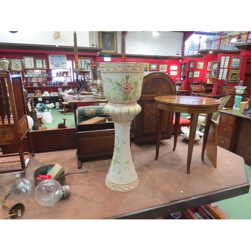 209 - A Cercapia late 20th Century Portuguese ceramic jardiniere on stand with floral detailing, hairline ... 