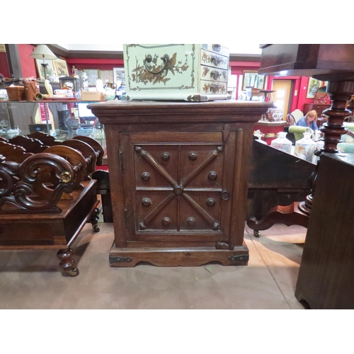 216 - A small Indian hardwood table top cupboard with decorative door, 58cm x 54cm x 31cm   (E) £20-30