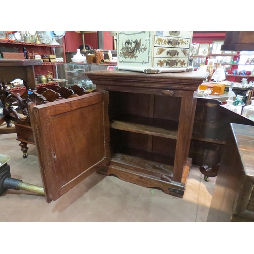 216 - A small Indian hardwood table top cupboard with decorative door, 58cm x 54cm x 31cm   (E) £20-30