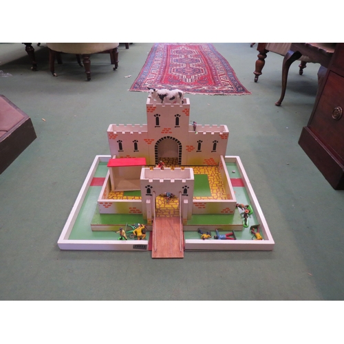 232 - A painted wooden fort with assorted plastic figures including Britains detail