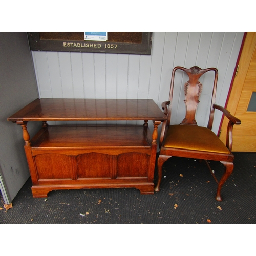 26 - An oak monk's bench with sliding back and a single carver dining chair