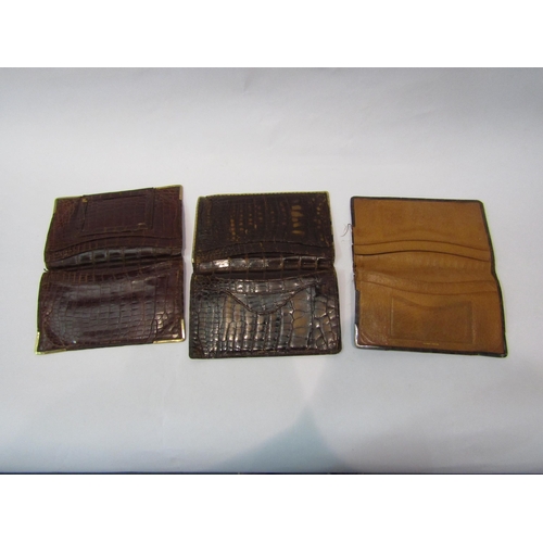 294 - Three Asprey crocodile skin wallets