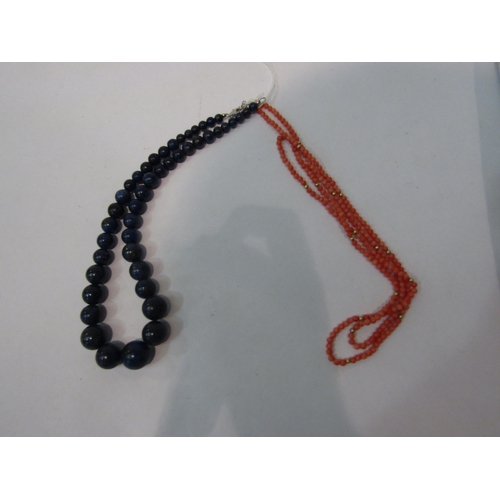 302 - A Lapis Lazuli graduated bead necklace and two coral necklaces   (E) £20-30