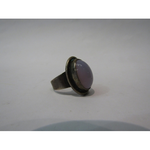 324A - An oval moonstone ring marked Denmark sterling