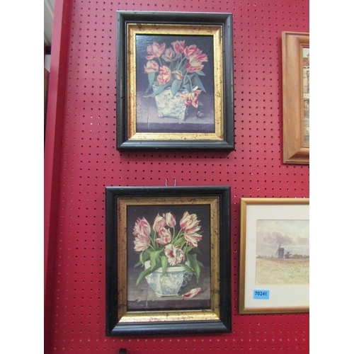 79 - A pair of ebonised and gilt framed prints of tulips, 25cm x 19cm