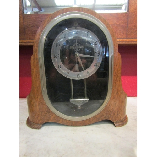 146 - A Gravity Suntime Art Deco style mantel clock, 28cm high