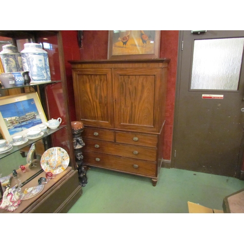 187 - A 19th Century mahogany linen press of small proportions. 163cm x 120cm x 56cm