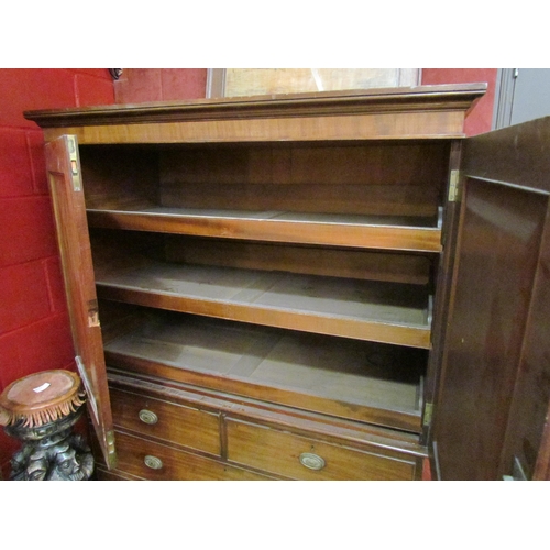 187 - A 19th Century mahogany linen press of small proportions. 163cm x 120cm x 56cm