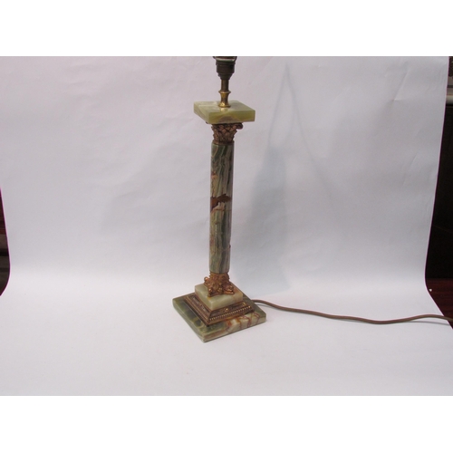 192 - A large onyx and ormolu table lamp on square base with acanthus leaf decoration   (R) £25