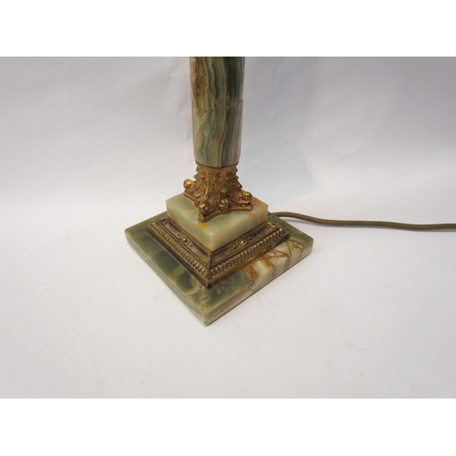 192 - A large onyx and ormolu table lamp on square base with acanthus leaf decoration   (R) £25