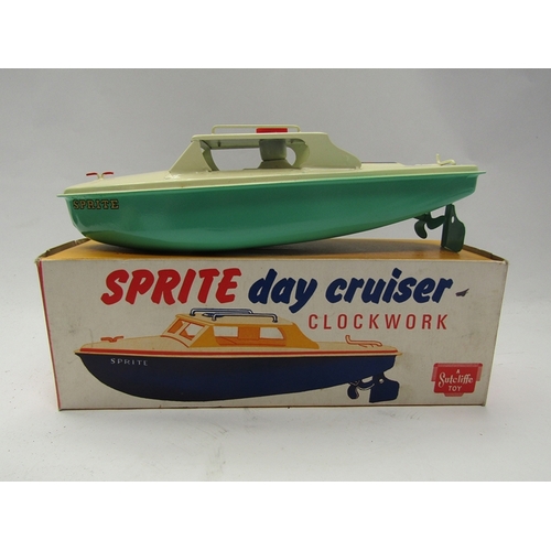 7365 - A boxed Sutcliffe Toy 'Sprite' Day Cruiser tinplate clockwork boat    (C)