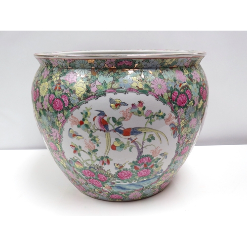 1059 - A Chinese fish bowl with character mark stamp to base, 30.5cm tall x 37cm diameter