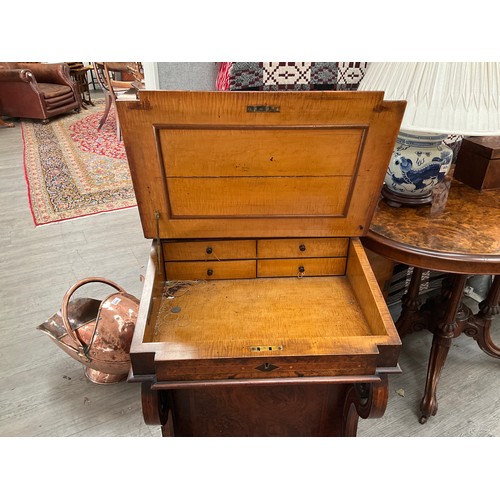 1083 - A Victorian walnut Davenport desk, slope top opening to reveal satinwood interior, side cabinet open... 