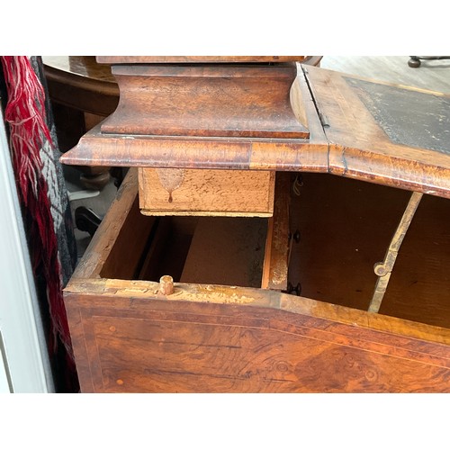 1083 - A Victorian walnut Davenport desk, slope top opening to reveal satinwood interior, side cabinet open... 