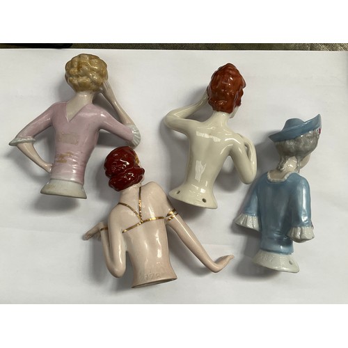 1245 - Four early 20th Century glazed china half dolls including flapper    (R) £50