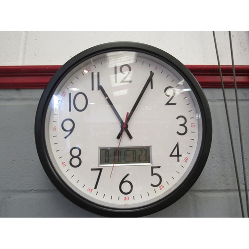 1254 - A wall clock with date, day and temperature display, 38cm diameter