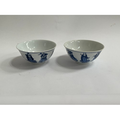 1279 - Two Chinese blue and white bowls, figural design, character mark to base, each approximately 14cm di... 