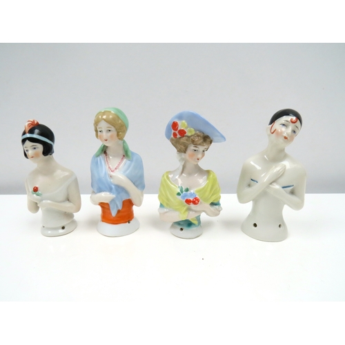 1280 - Four early 20th Century glazed china half-dolls including Pierrette, tallest 9cm tall.   (R) £60