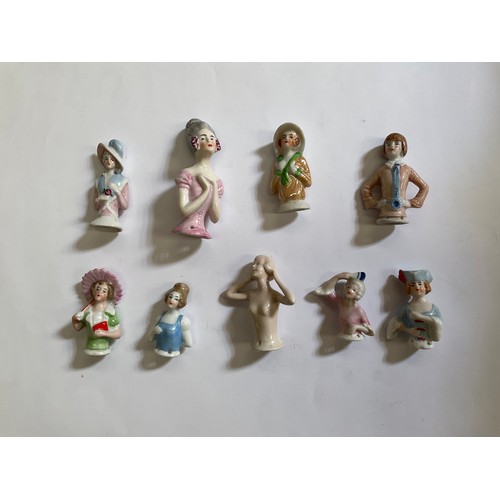 1283 - Nine early 20th Century glazed china pin cushion dolls    (R) £40