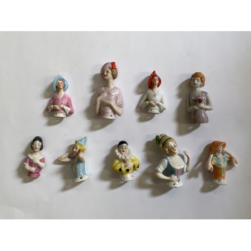 1285 - Nine glazed china half dolls and pin cushions including Pierrette, tallest 6.5cm   (R) £40