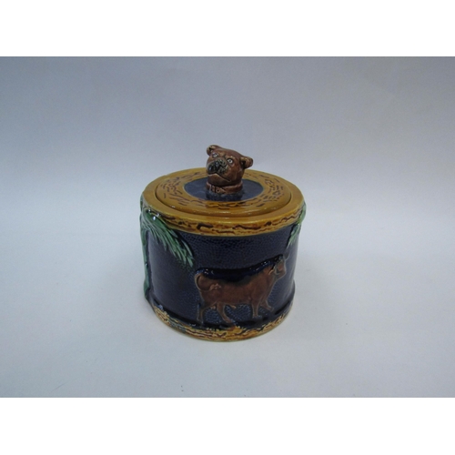 1306 - A 19th Century Majolica lidded pot with cattle detail, dog head finial. 11.5cm high