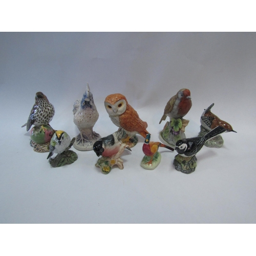 1309 - A group of bird figures including Beswick (9)