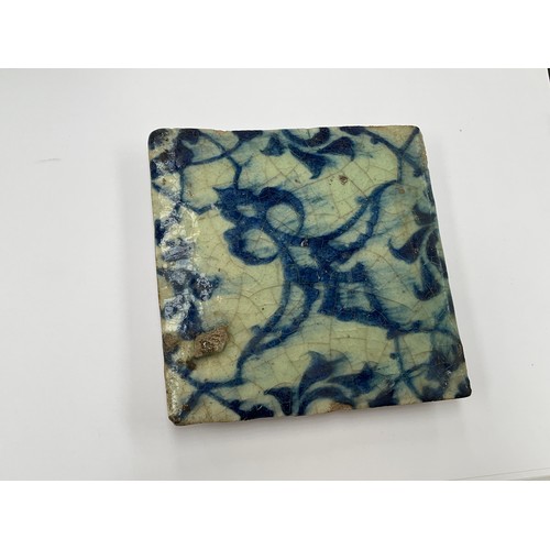 1318 - A 16th Century Ottoman tile thought to be from the structure of the Dome of the Rock, Iznik blue and... 