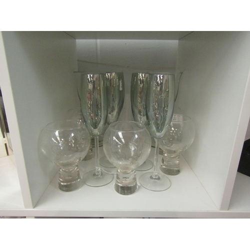 1351 - Various drinking glasses including champagne flutes, large wine and footed tumblers