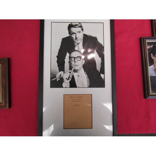 1453 - A framed and glazed photograph of Morecambe & Wise bearing signature, no provenance  (R)  £60