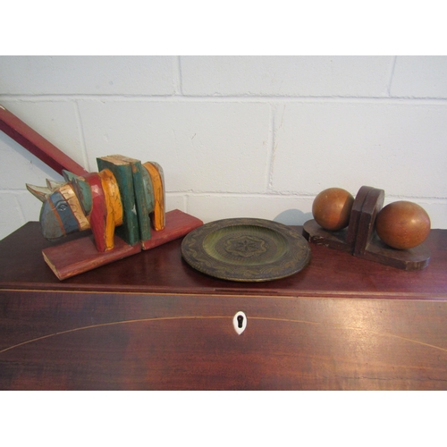 1004 - Two pairs of wooden bookends, rhino and ball and a wooden plate