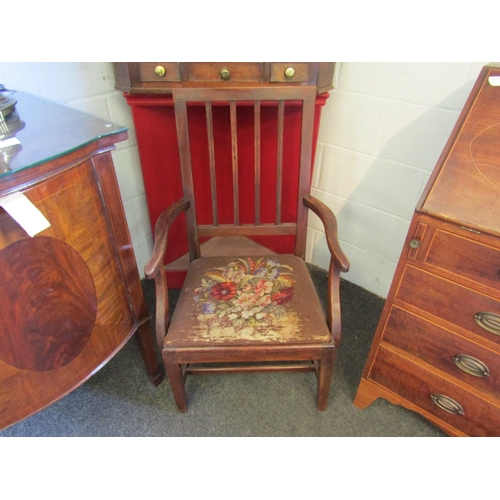 1007 - A Georgian carver chair with tapestry drop-in seat. Seat worn    (E) £15-20