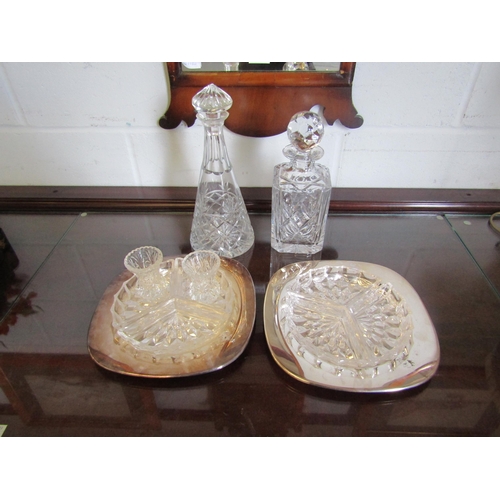 1012 - Two crystal glass decanters, a pair of thistle form small vases and two serving dishes (6)